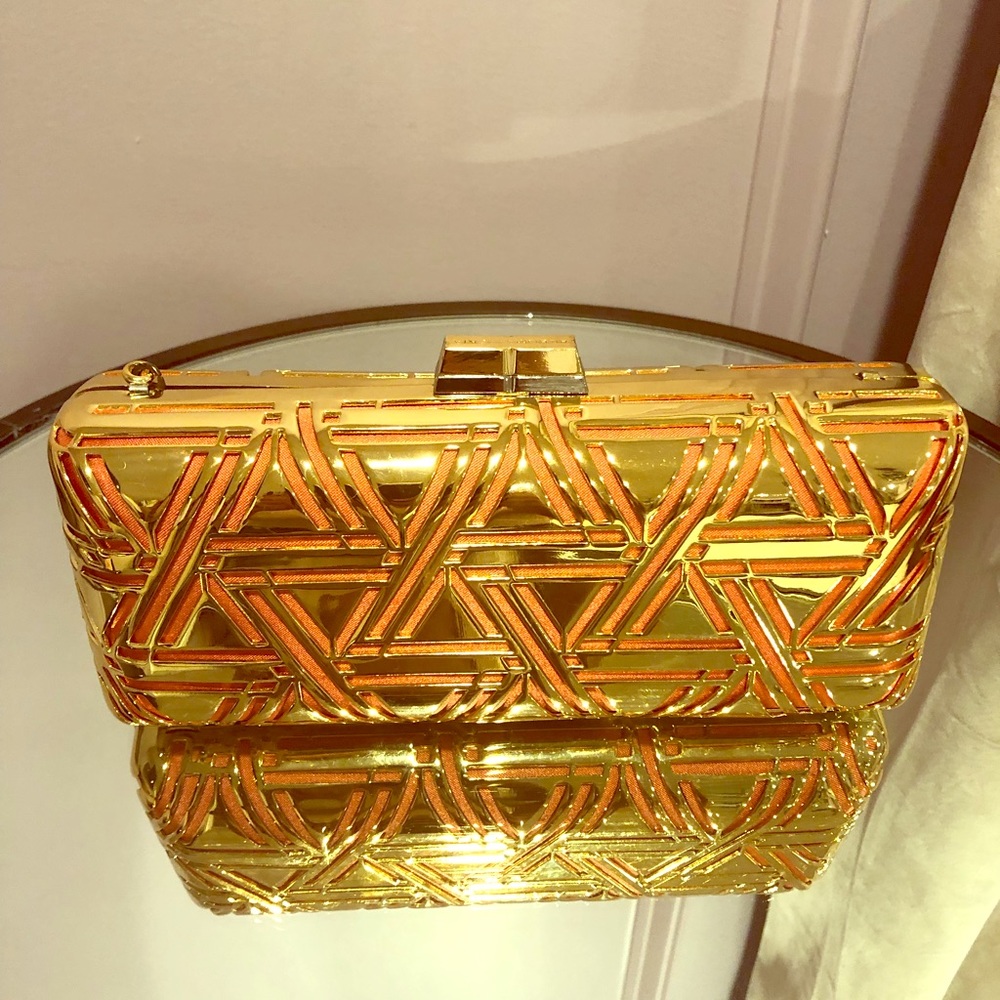 Gold and Orange BCBGMAXAZRIA clutch on chain